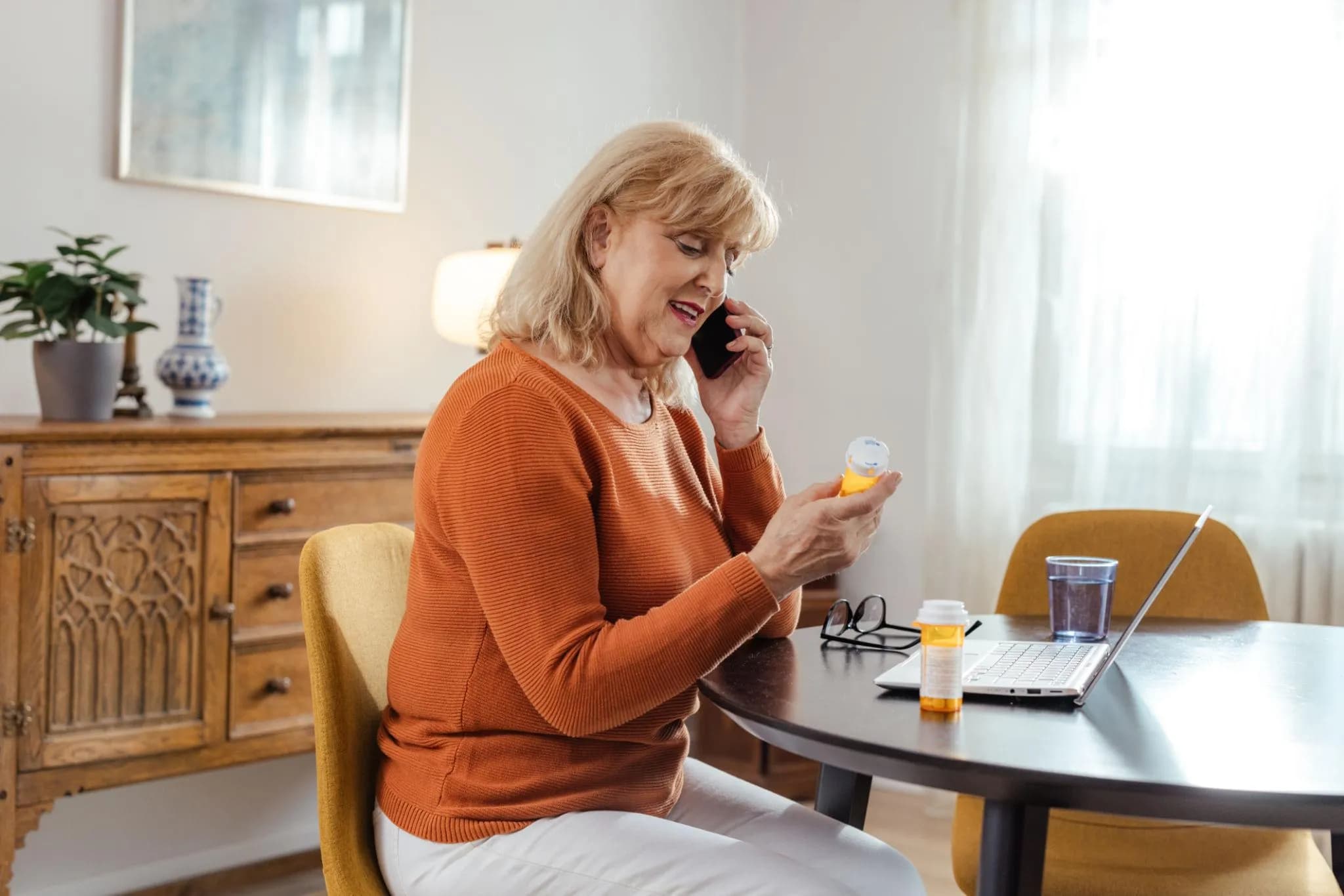 Pharmacy staff on phone
